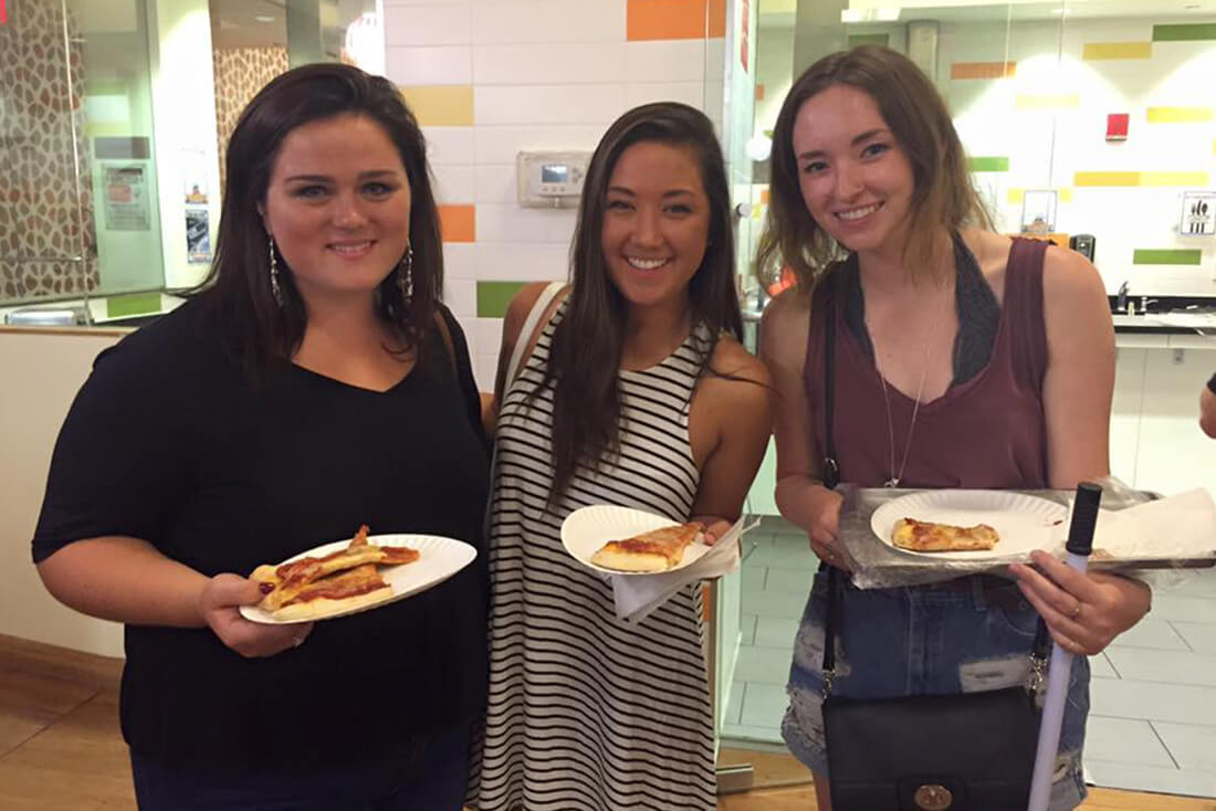 Residents getting to know each other at the Pizza Meet & Greet during move-in week